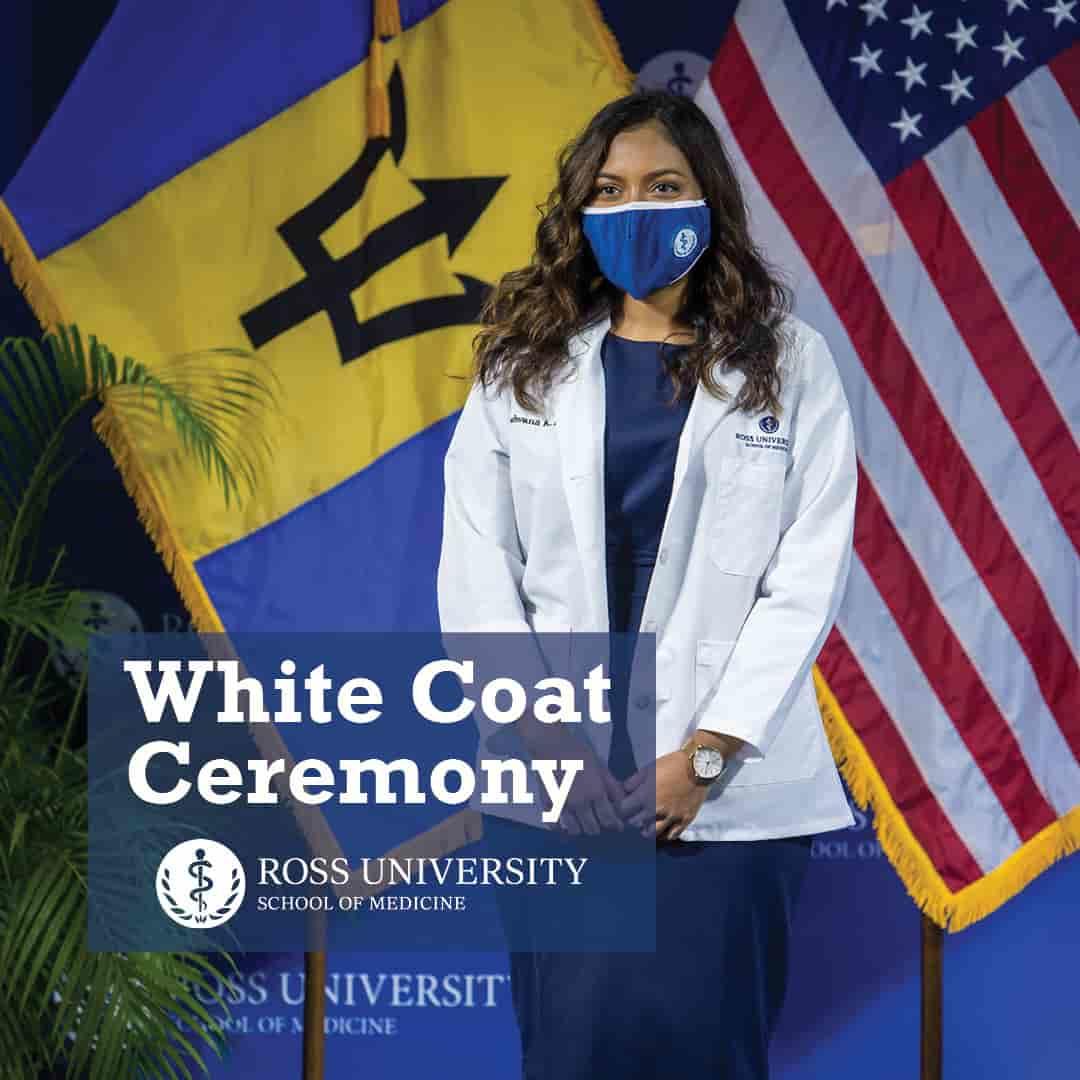 student in white coat at white coat ceremony
