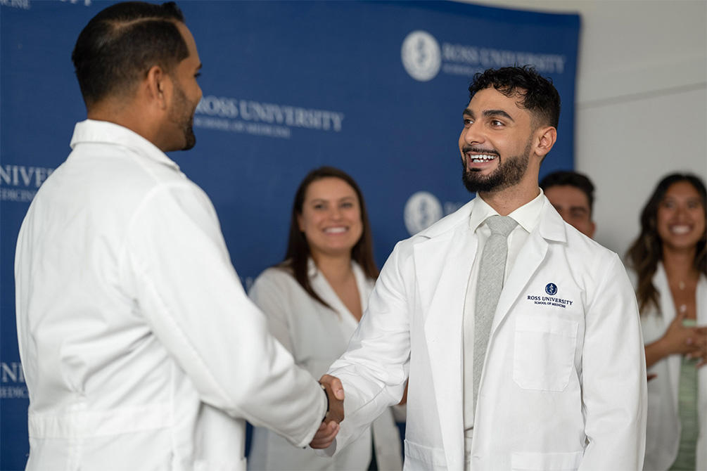 Student with White Coat